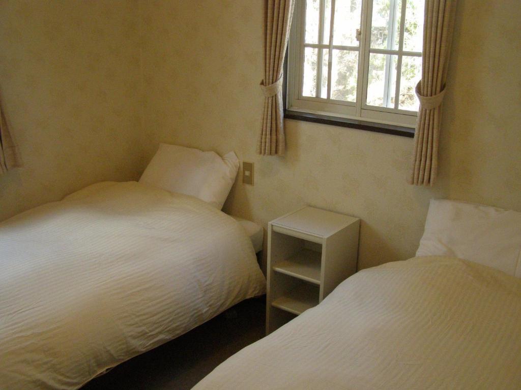 Sunny Side Hut Bed & Breakfast Hakuba Rom bilde